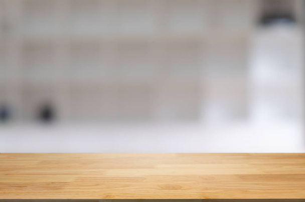 порожній дерев'яний стіл з розмитим монітором кав'ярня фону кафе
. - Фото, зображення