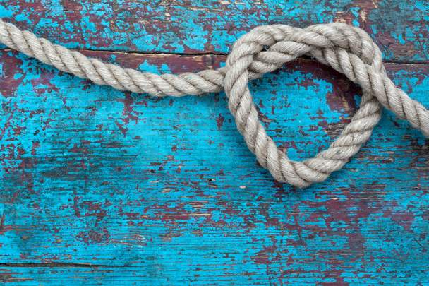 Heart from rope on blue background - Fotografie, Obrázek