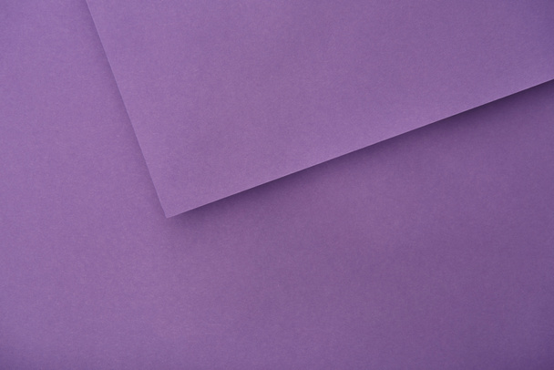 top view of violet paper sheets with copy space - Photo, Image