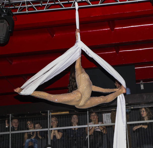 YOSHKAR-OLA, RUSSIA, DECEMBER 08, 2018: Dance and acrobatic show - love is 2018, from CrazyPole dance and aerial acrobatics Studio. - Photo, image