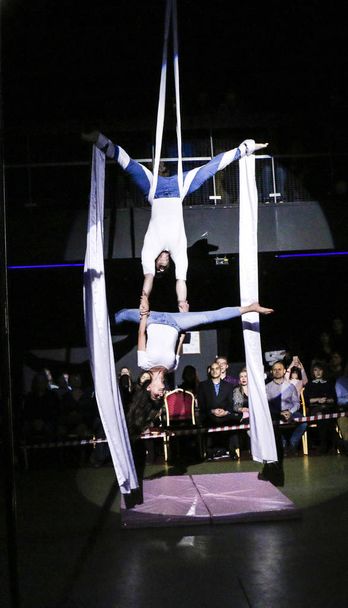 YOSHKAR-OLA, RUSSIA, DECEMBER 08, 2018: Dance and acrobatic show - love is 2018, from CrazyPole dance and aerial acrobatics Studio. - Фото, изображение
