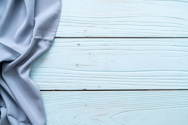 kitchen cloth (napkin) on blue wooden background with copy space - 写真・画像