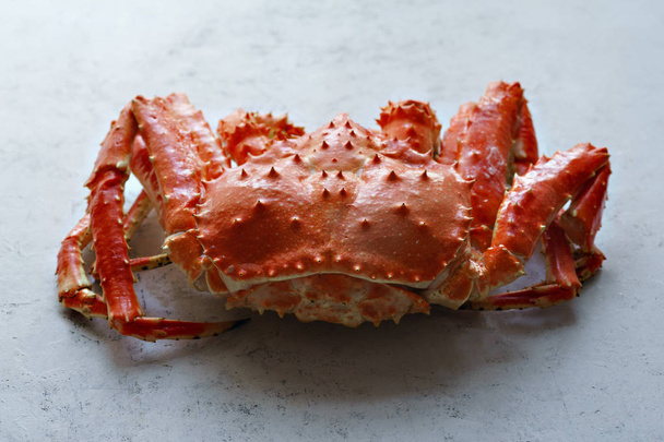 Big whole alaskan crab on concrete background - Фото, зображення