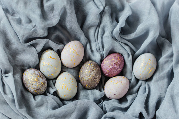 Stylish gray, violet and blue Easter eggs. Homemade naturally dyed Easter eggs  - Фото, изображение