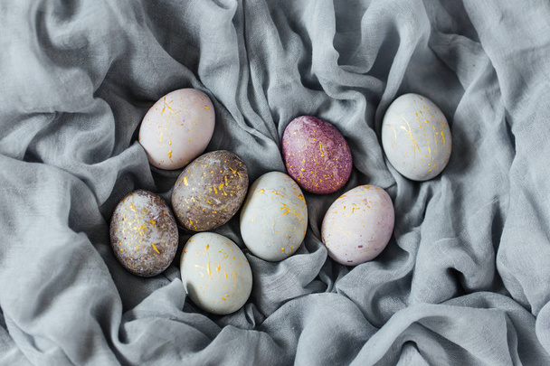 Stylish gray, violet and blue Easter eggs. Homemade naturally dyed Easter eggs  - Φωτογραφία, εικόνα