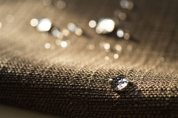 Water repellent and waterproof fabrics. How to waterproof fabric with these simple instructions for Experiment by drop water on it - Fotografie, Obrázek