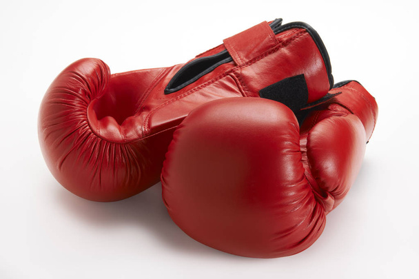 Pair of red boxing gloves isolated on white background - Photo, image