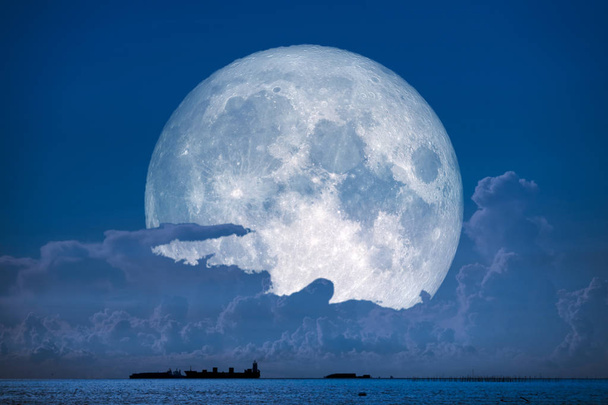 super snow moon back on night sky silhouette cloudon sea, Elements of this image furnished by NASA - Photo, Image