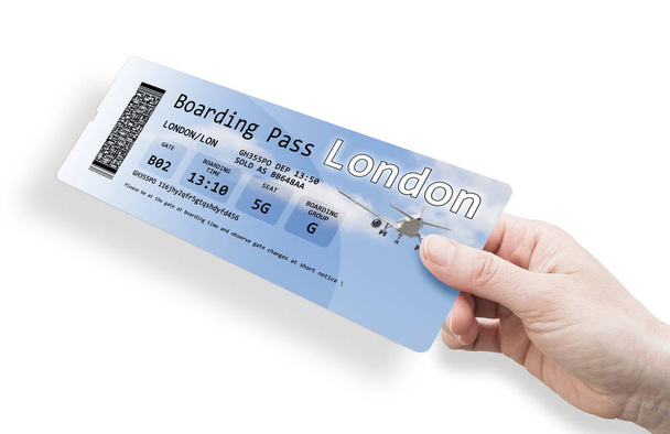 Keze a nő, kezében egy repülőjegy Londonba - elszigetelt fehér kép - Fotó, kép