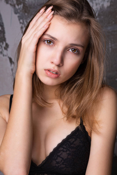 Test shooting for tender young woman wears lace bra. Closeup shot - Φωτογραφία, εικόνα
