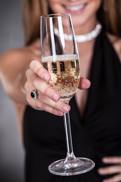 Woman Offering Champagne - Foto, immagini