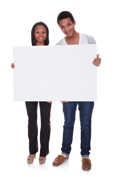 Young Couple Holding Placard - Foto, Imagem