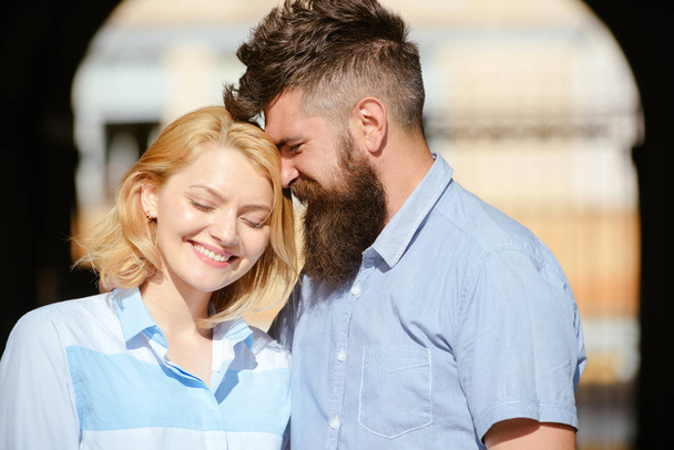 Feeling happy together. Loving couple of woman and hipster dating outdoor. Sensual woman and bearded man enjoy romantic date. Couple in love on summer day. Feeling love and romance - Fotoğraf, Görsel