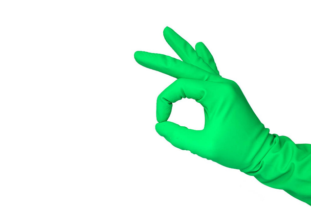 Close up view of human hand with rubber glove showing ok, isolated on white - Photo, Image