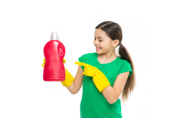 Help clean up. Use professional product for cleaning. Useful product housekeeping. Cleaning supplies. Girl in rubber gloves for cleaning hold big plastic bottle chemical soap liquid white background - Foto, Imagem