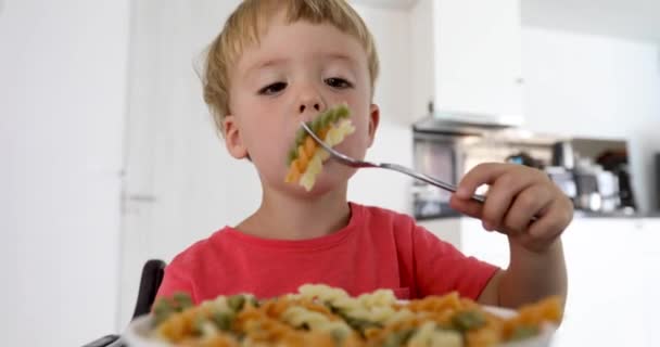 Kid eating macaroni - Footage, Video