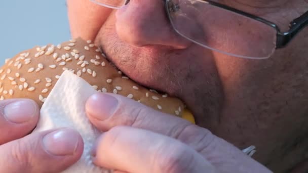 mouth lips man eating a tasty hamburger. - Footage, Video