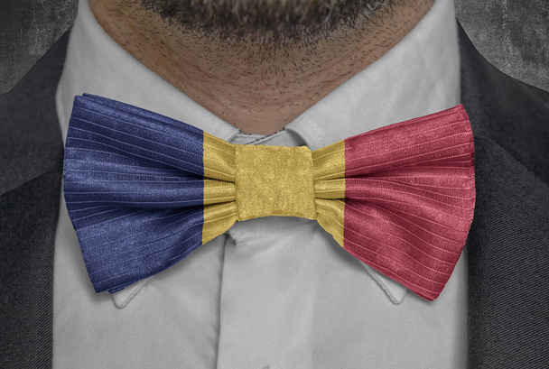 Country national flag of Chad on bowtie business man suit - Fotó, kép