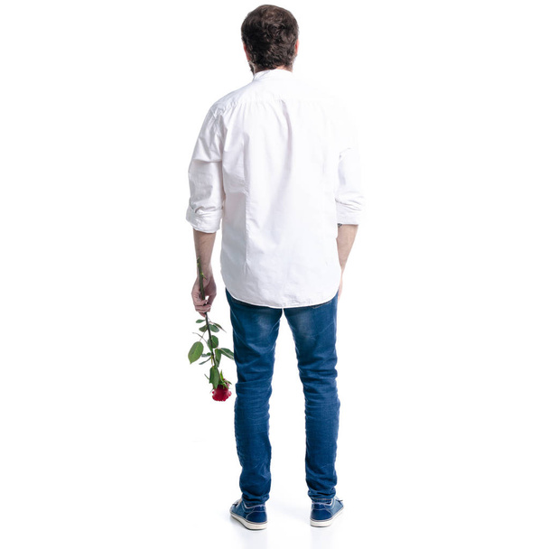 Man with rose in hand - Foto, imagen