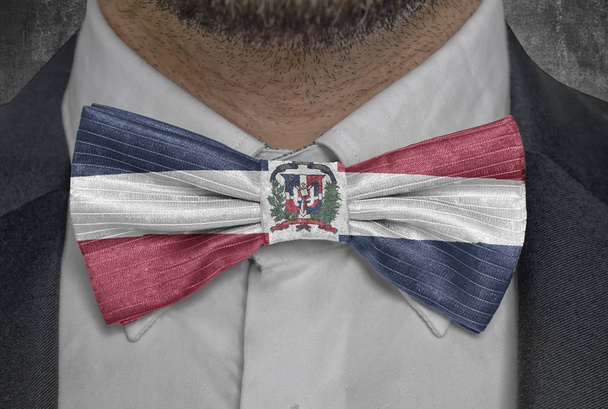Flag country Dominican Republic on bowtie business man suit - Foto, Imagen