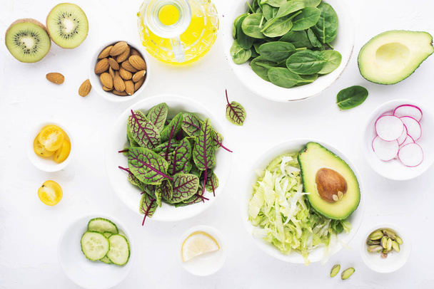 Healthy food. Ingredients for a fresh green vegetarian vegetable salad from fresh vegetables. Top view. - Foto, imagen