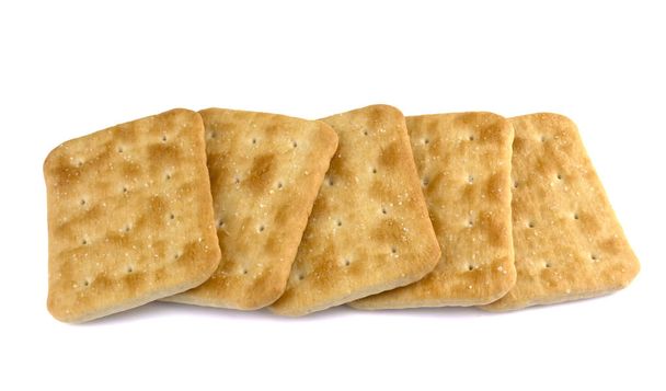 Biscotti cracker a secco isolati su sfondo bianco, concetto di cibo - Foto, immagini