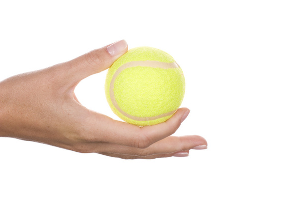 balle de tennis dans la main de la femme
 - Photo, image