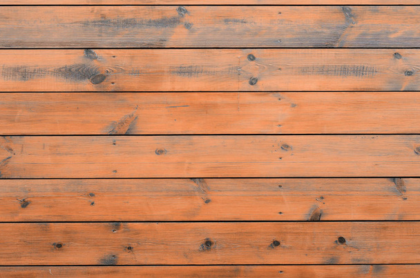 Gelakt hout achtergrond van cabine-exterieur. Bruin houten schuur plank ruw graan oppervlakte achtergrond - Foto, afbeelding