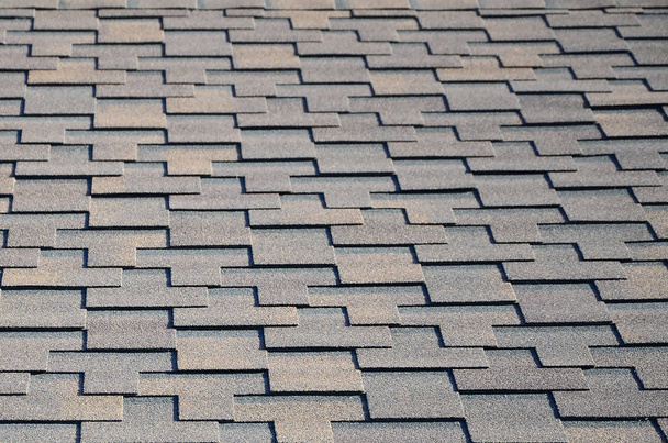 Modern roofing and decoration of chimneys. Flexible bitumen or slate shingles in rectangular shape in perspective. - Photo, Image