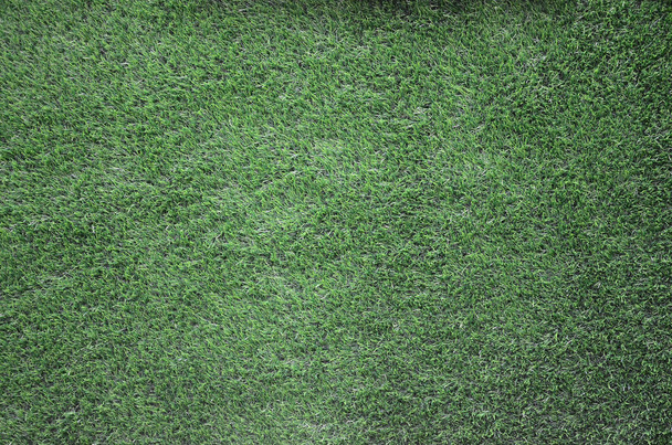 Fondo de hierba verde, fondo texturizado patrón de césped verde. Fragmento oscuro del campo de fútbol
 - Foto, Imagen