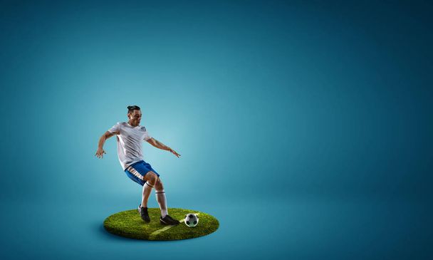 Soccer player on round pedestal. Mixed media - Valokuva, kuva