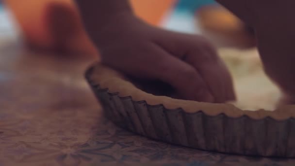 The woman kneads dough hands. Close up. Cooking in house conditions. Tasty pastries. Side view - Materiał filmowy, wideo