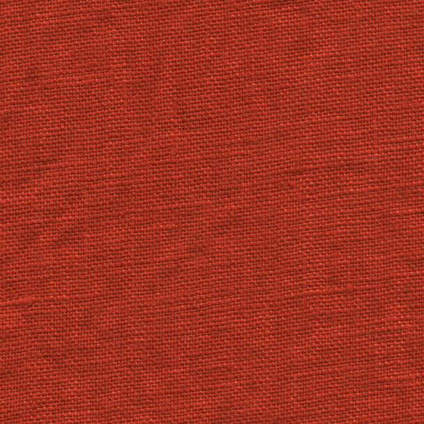 赤いリネンのファブリックのテクスチャです。赤い布の背景  - 写真・画像