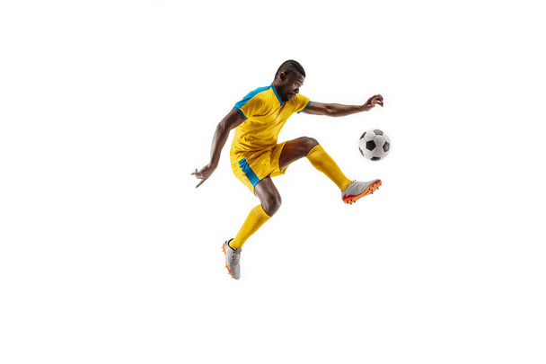 Professional african football soccer player isolated on white background - Foto, afbeelding