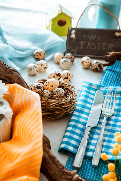 Easter table setting. Fresh eggs on plate. Spring table. - Foto, Imagen