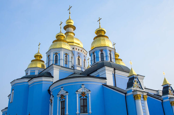 Blue Orthodox Church with golden rooftops - Photo, Image