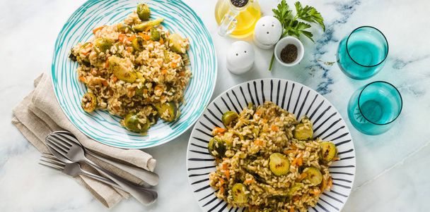 banner of spring risotto on a marble table with spices and olive oil - Photo, Image