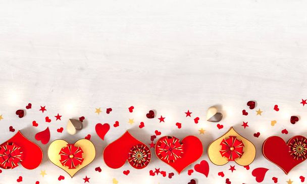 3d rendering. Composition figure volumetric brilliant heart, red, gold, Valentine's Day or wedding day romantic themes for party, events, heart shaped box, gift. Glowing garlands, bulbs, illumination. - Photo, Image
