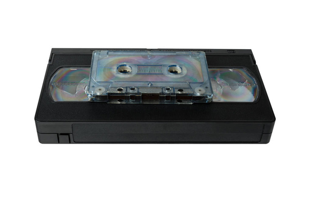 audio tape cassette and VHS video tape cassette isolated on white background. - Photo, Image