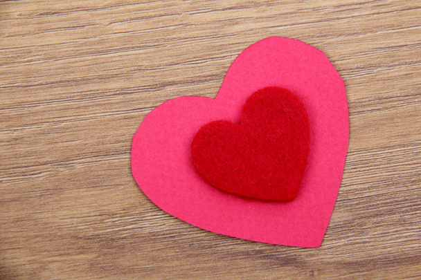 Red heart on wooden background - Foto, Bild