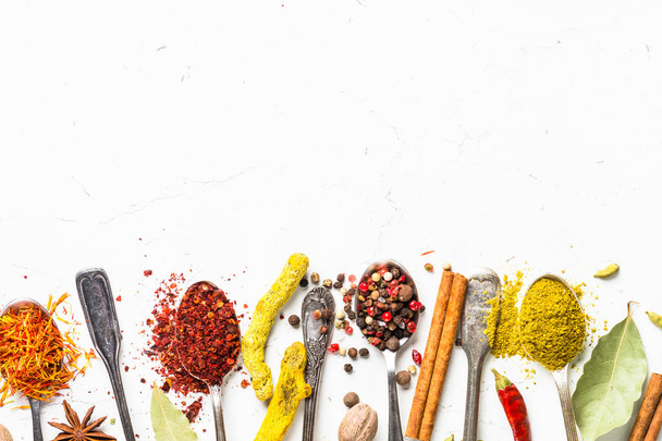 Set of various spices in spoons on white - Foto, immagini