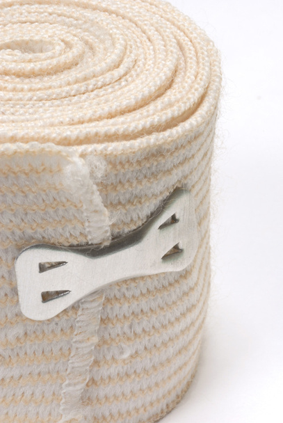 elastic tensor bandage with clip holding it together - 写真・画像