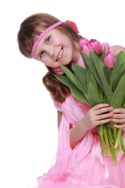 Portrait of a little girl with a big bouquet - Foto, afbeelding