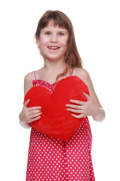 Lovely little girl with heart symbol on white background - Foto, Imagen