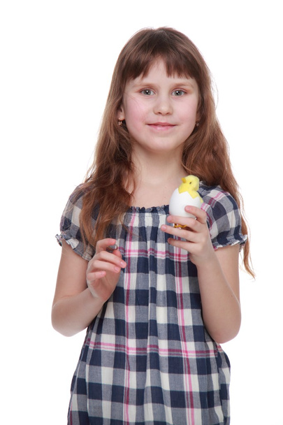 Pretty little girl holding an Easter decoration - Фото, зображення