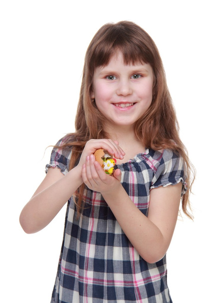 Pretty little girl holding an Easter decoration - Fotó, kép