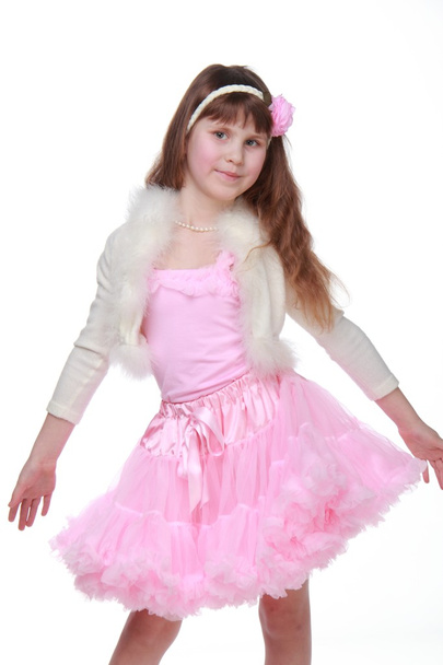 Beautiful child in a tutu posing for the camera - Photo, Image