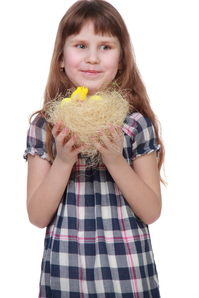 Pretty little girl holding an Easter decoration - Foto, Imagen