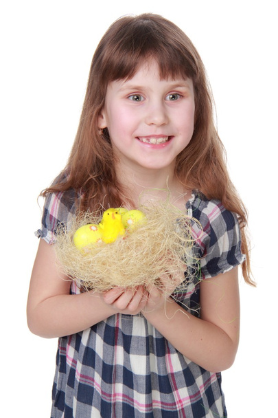 Pretty little girl holding an Easter decoration - Fotoğraf, Görsel