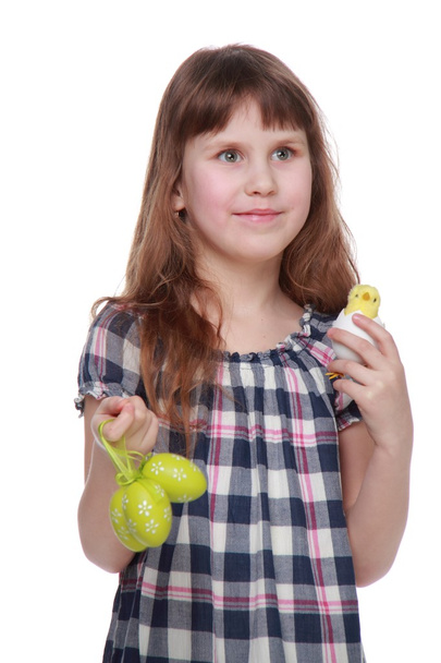 Pretty little girl holding an Easter decoration - Foto, afbeelding